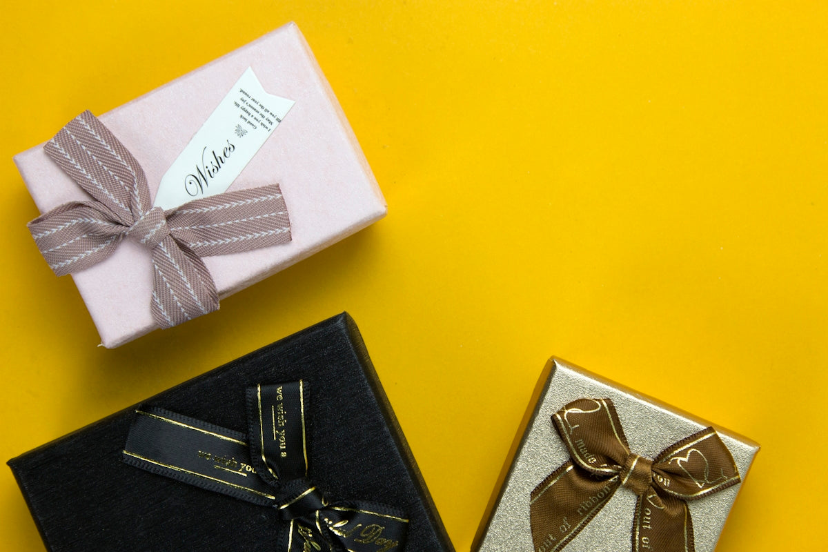 a couple of wrapped presents sitting on top of a table