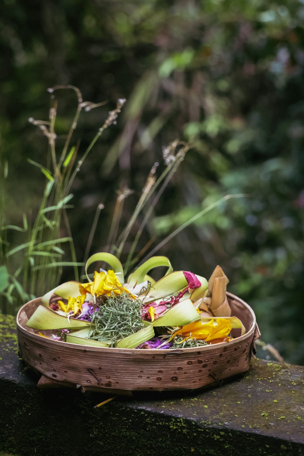 A basket of food sitting on top of a wooden table